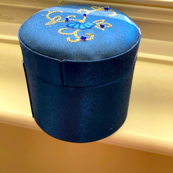 NWT embroidered jewelry box. 62 %polyester. 38 % nylon.